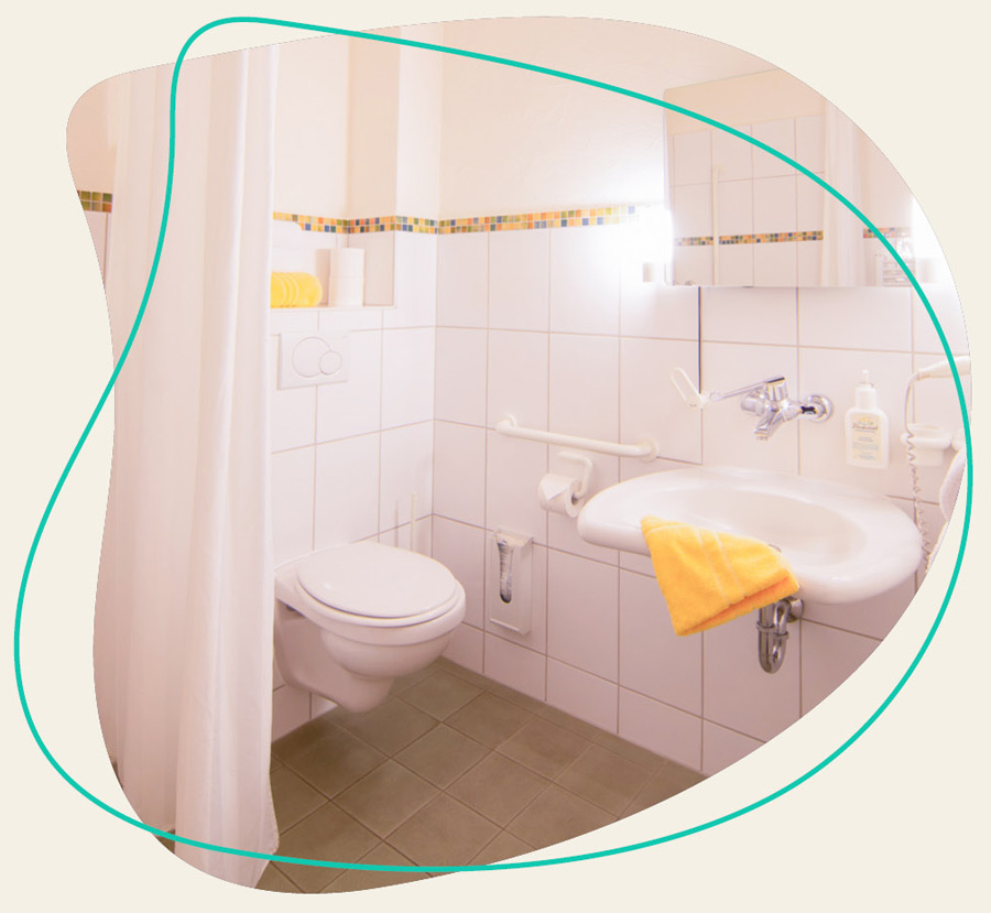 Badezimmer für unsere Gäste abgebildet im Ferienhotel beim WDL Dünenhof